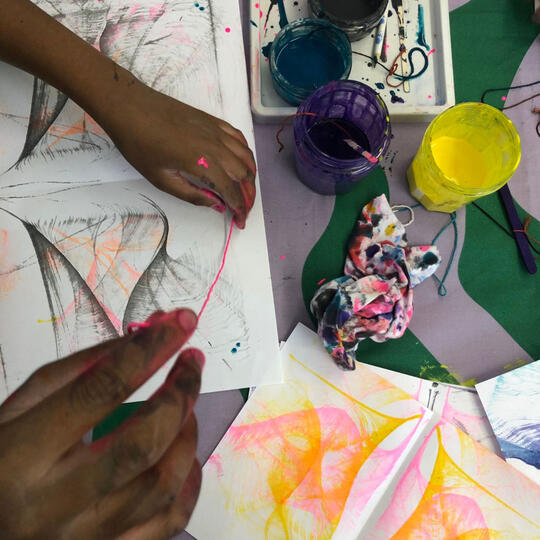 Bright background colours printed with triangular shapes on the top