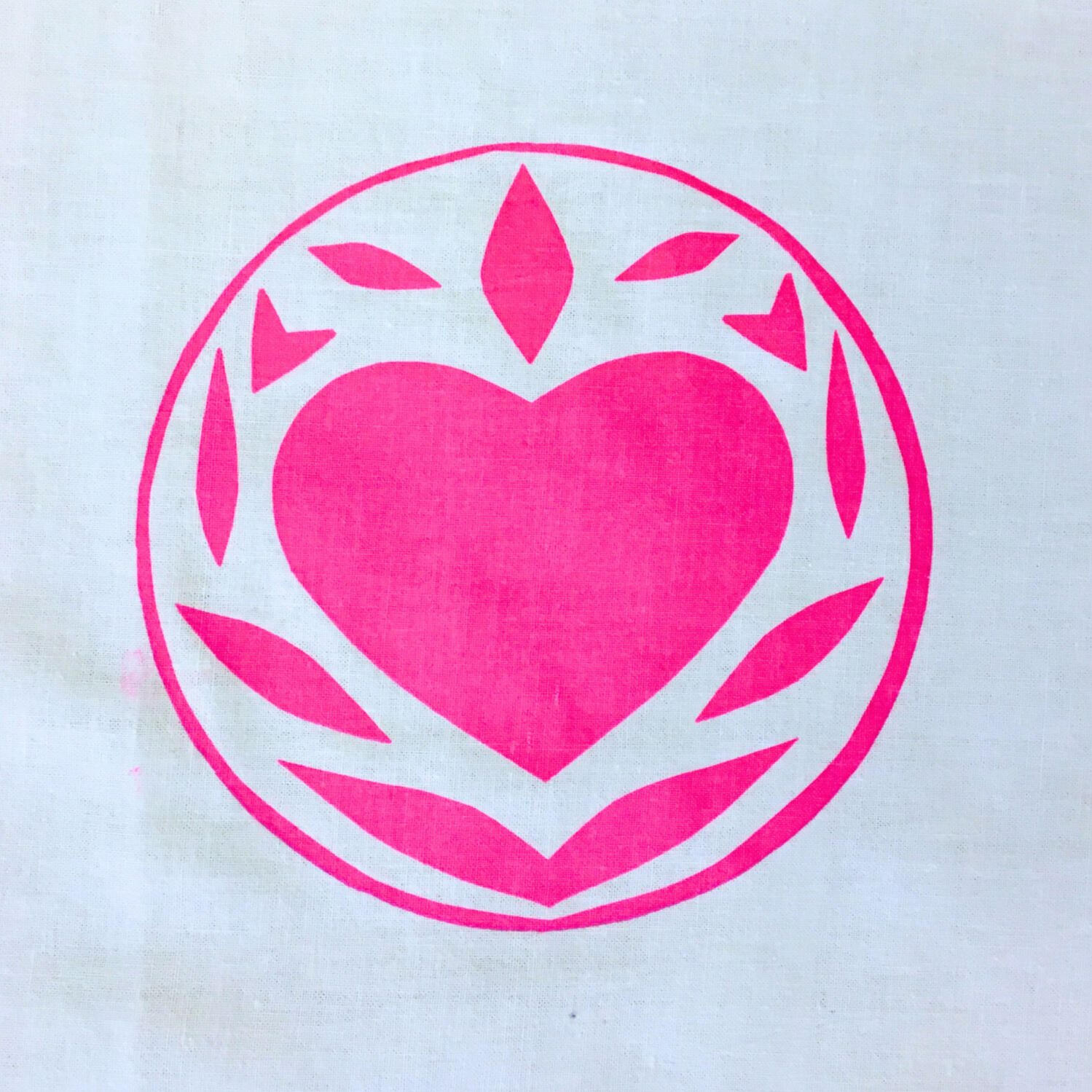 Gel printed paper stencil design printed onto a purple background as inspiration for a gelli printing club.